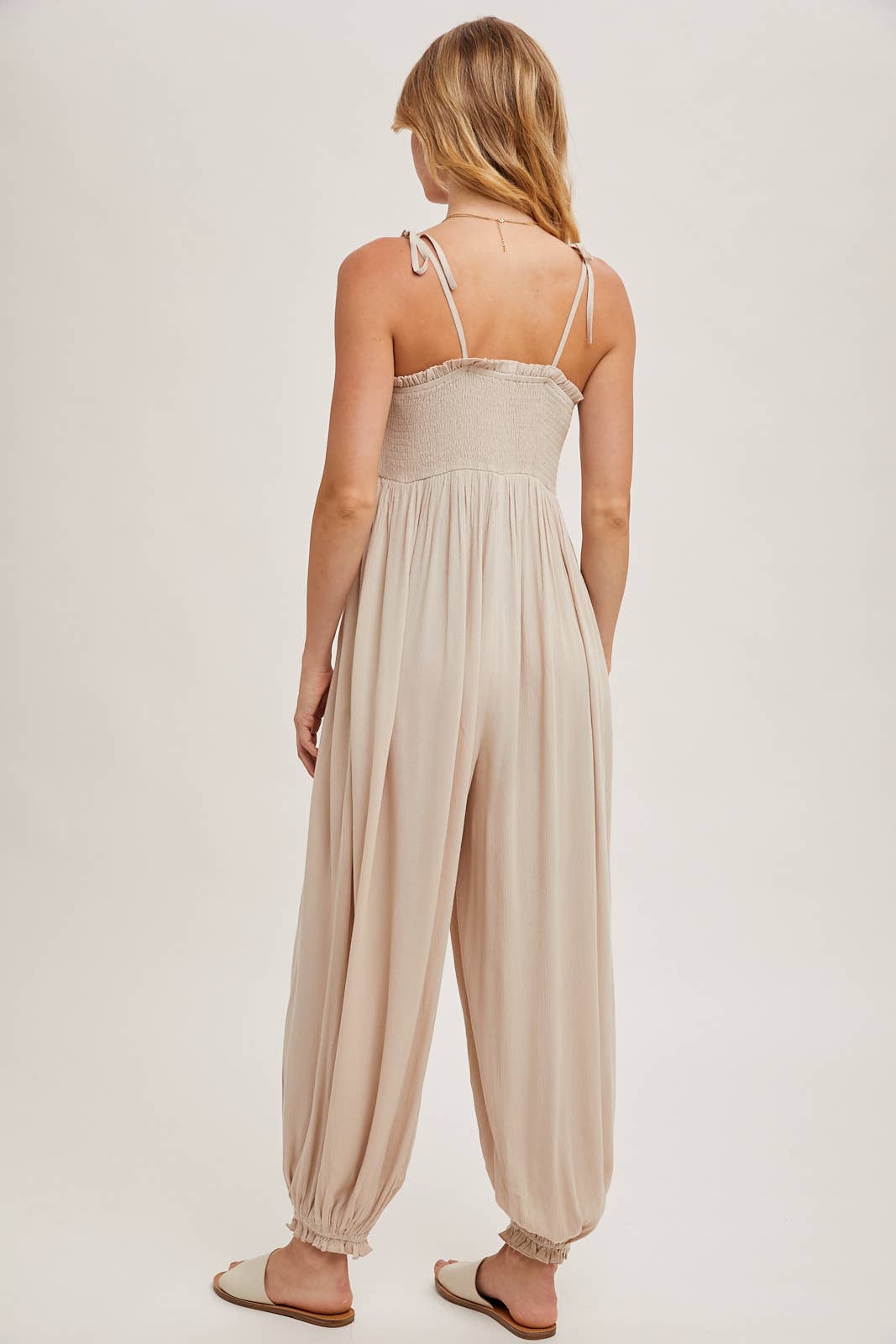 GAUZE SMOCKED BUTTON FRONT SHOULDER TIE JUMPSUIT